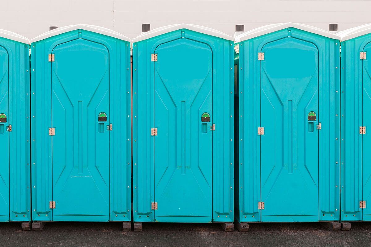 Industrial portable restroom units at a plant in Billings, Montana